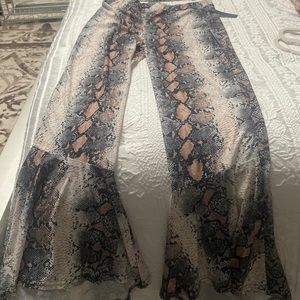 Beautiful 2 piece Flare pants crap off the shoulder top looks like snake skin.